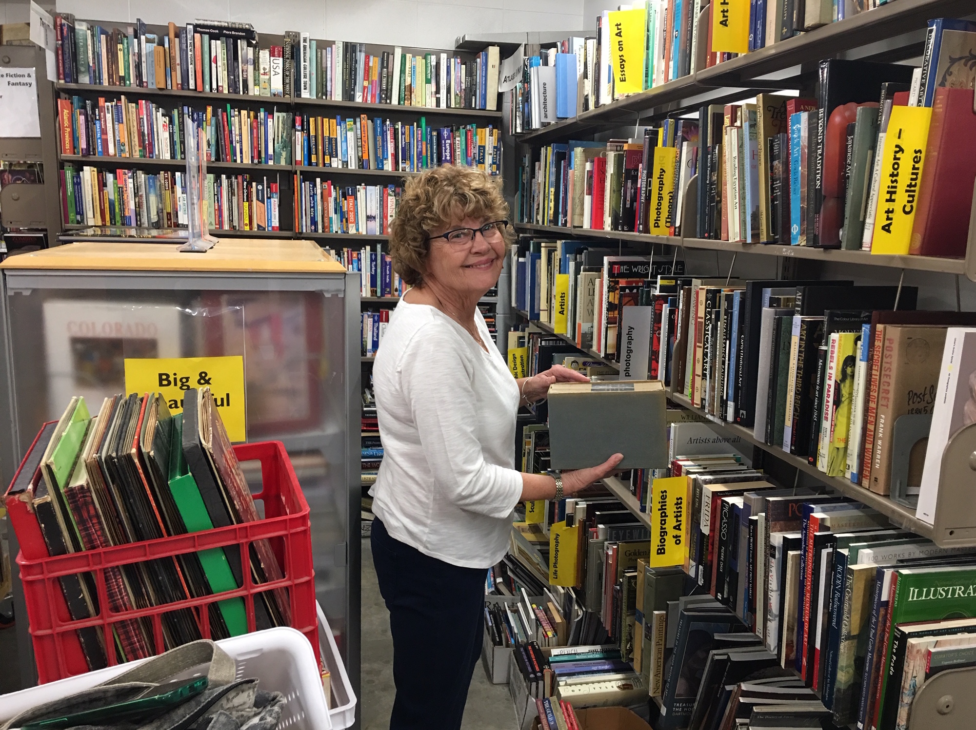 Upcoming events include Summer Book Sale, candidate town hall, theater ...